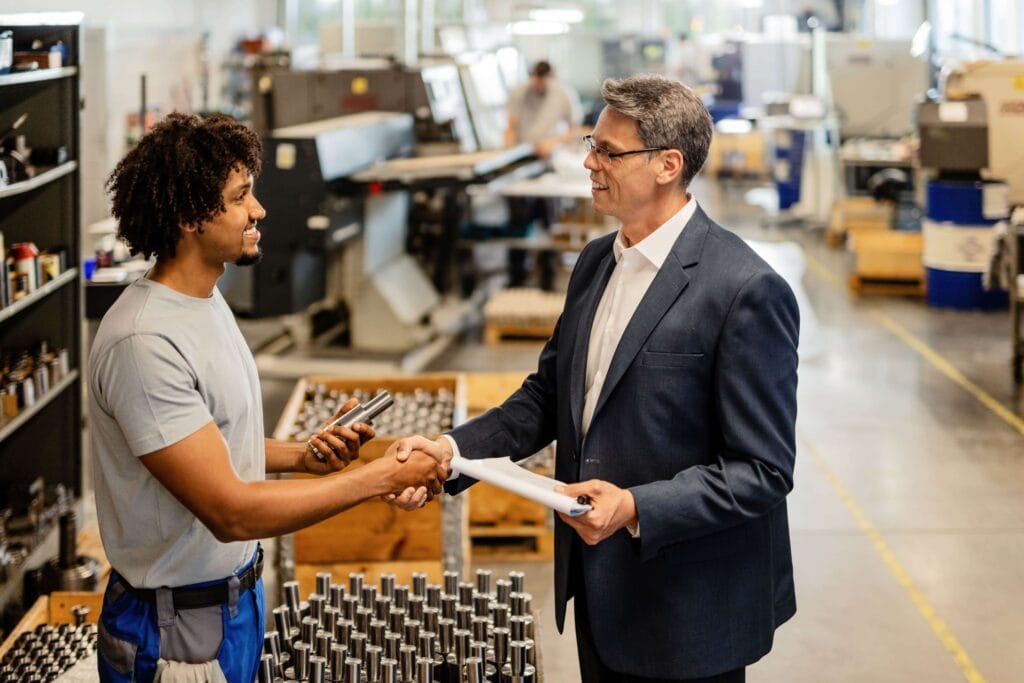 man handshake cnc machine shop in toronto ontario canada